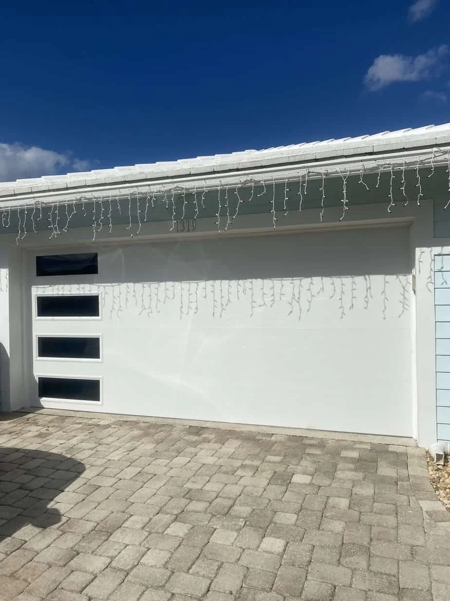 White garage door with vertically arranged windows