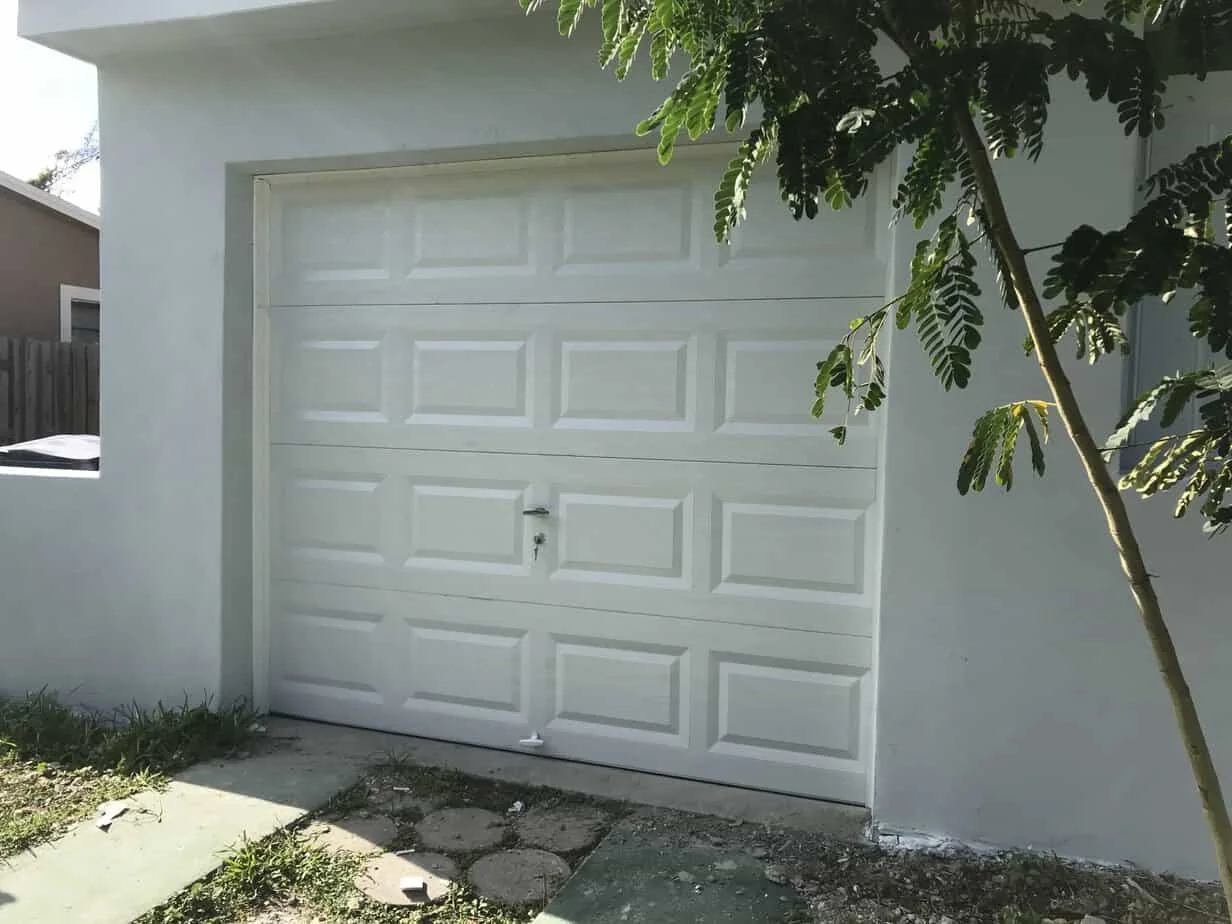White single-width panel garage door